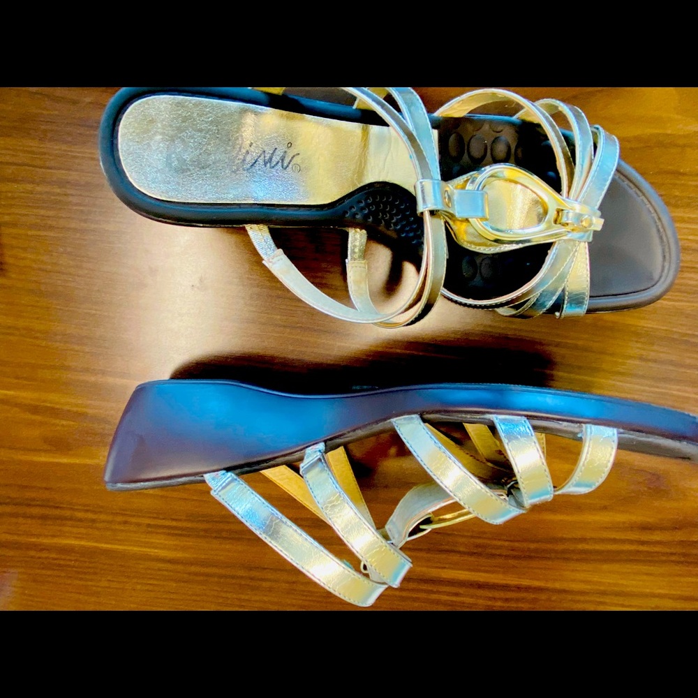 Gold slippers fit like a size 11